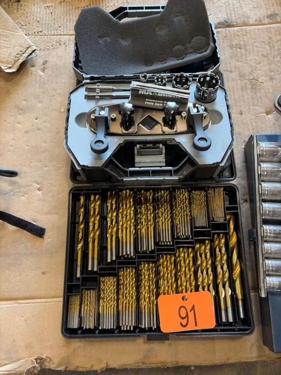 Drill bits and diamond grit hole saw