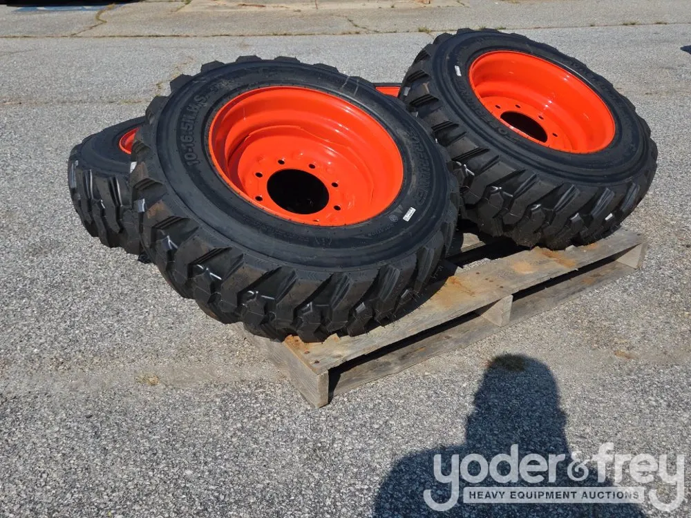 Unused 10-16.5 Tires w/ Rims to suit Bobcat Skidsteer (4 of)
