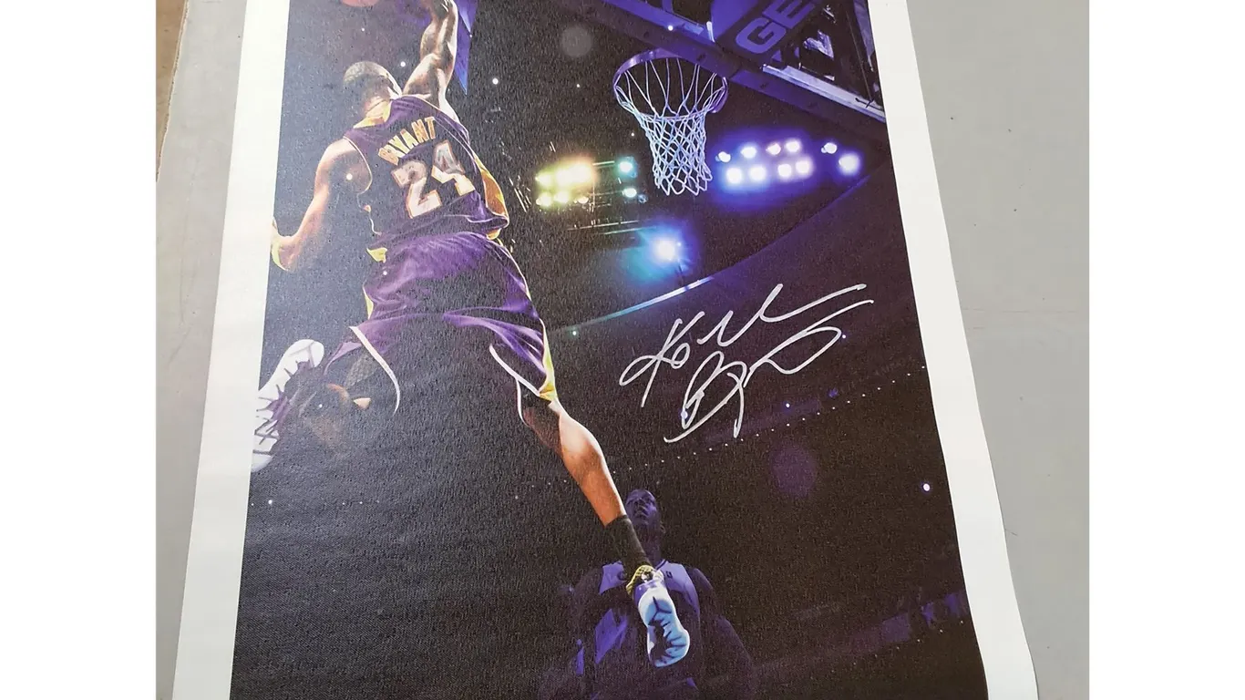 Signed Kobe Bryant Basketball Poster ( cannot authenticate)