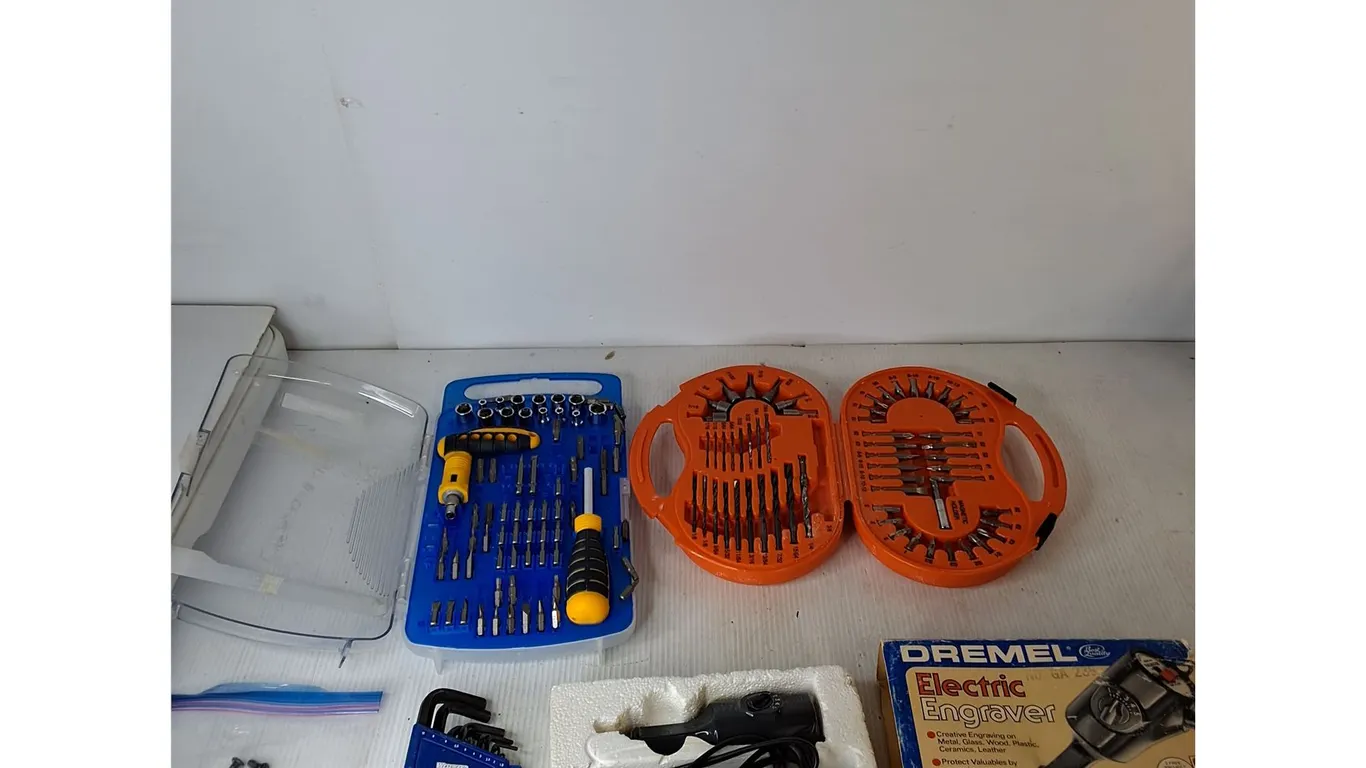 (2) Drill Bit Sets, Dremel Electric Engraver (powers on), Misc