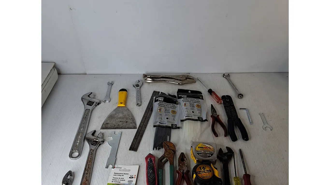 Wrenches, Screwdriver, Zip Ties, Pliers, Tape Measures, Replacement Washers, Misc ( as is)
