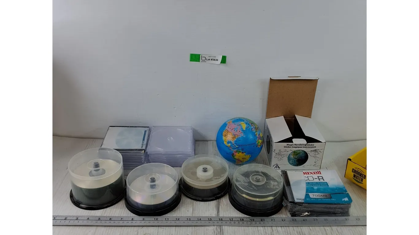 Assorted Blank CDs, Magnetic Revolving Globe Powers On