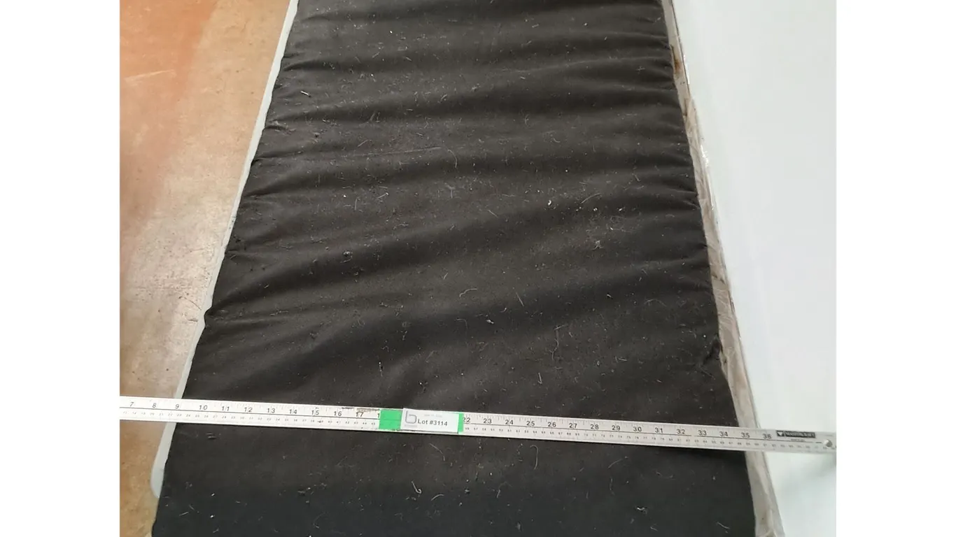 Black Padded Cushion ( animal hair on it) 72"x26" ( cannot ship)
