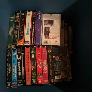 22 VHS Movie Tapes Including Batman Forever, The Exorcist, Face/Off, And More