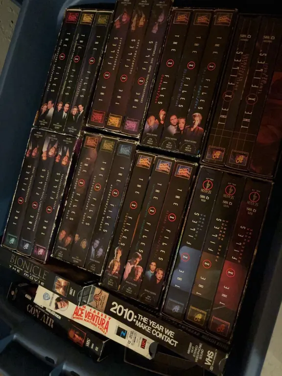 Large Mixed Lot of VHS Tapes Including The X-Files and Blockbuster Films
