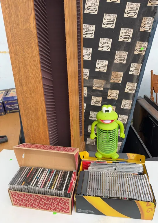 Over 70 Rock and Pop CDs with Green Frog CD Holder