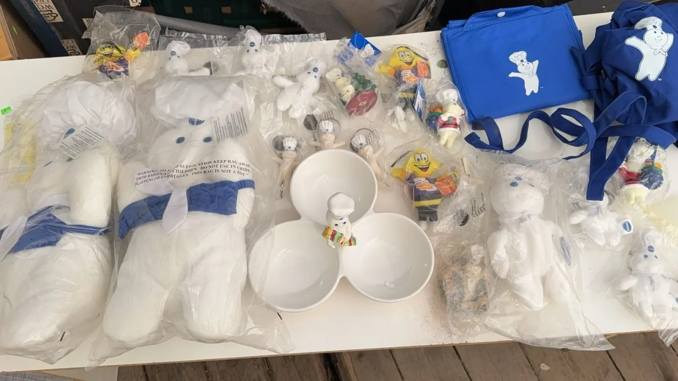 Pillsbury Doughboy Collectibles Including Plush, Ceramics, Bags, and Calendar