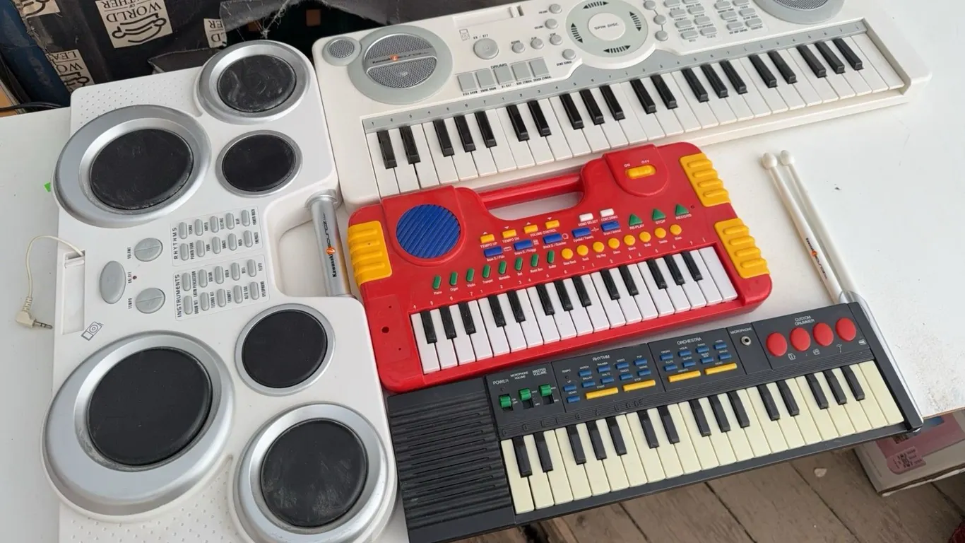 Three Electronic Keyboards and One Drum Machine