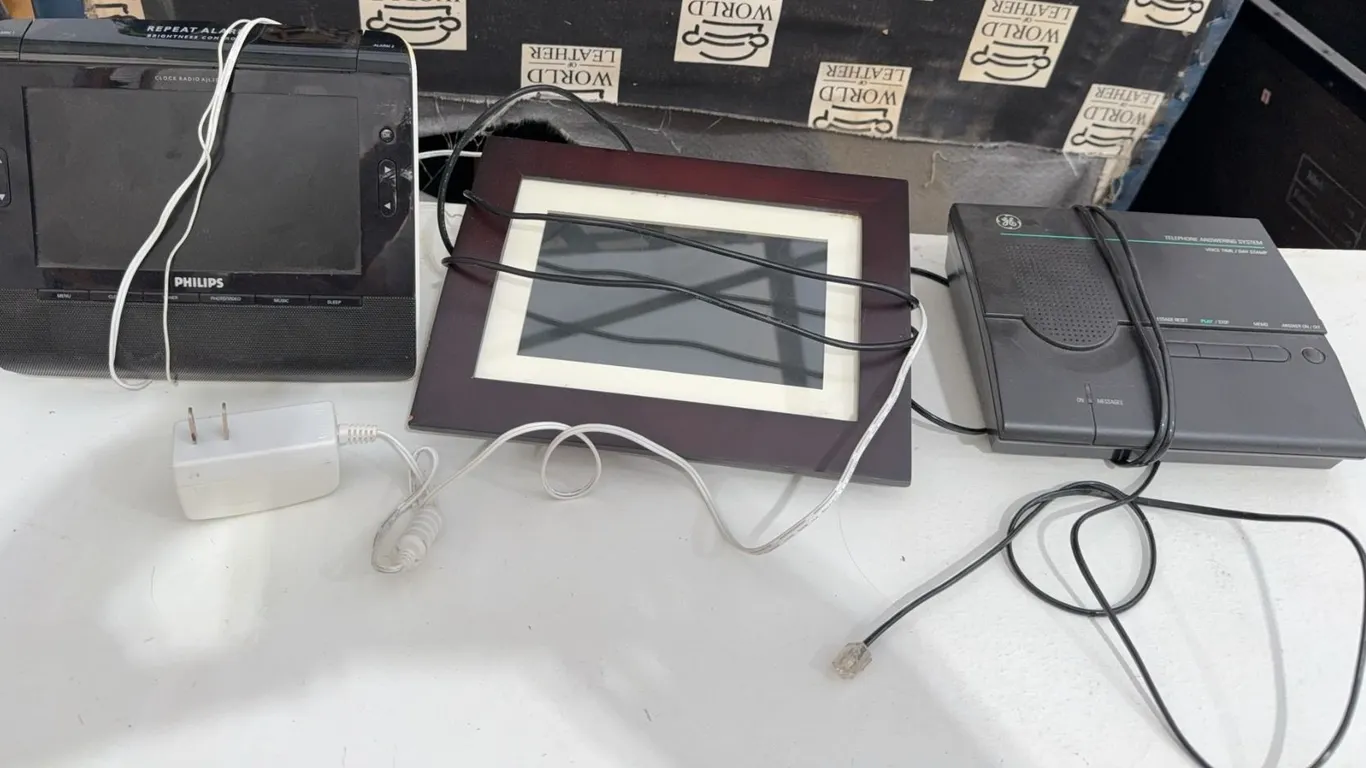Electronics Assortment: Philips Clock Radio, Sylvania Digital Photo Frame, GE Answering System