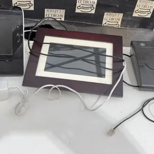 Electronics Assortment: Philips Clock Radio, Sylvania Digital Photo Frame, GE Answering System