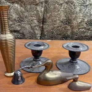 Metal Decor Lot with Candlestick Holders, Vase, Bell, and Duck Figures