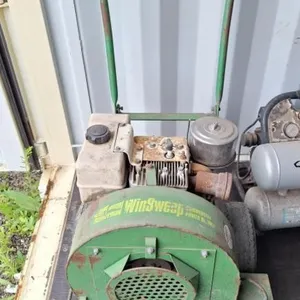 Green WinSweep commercial walk-behind power