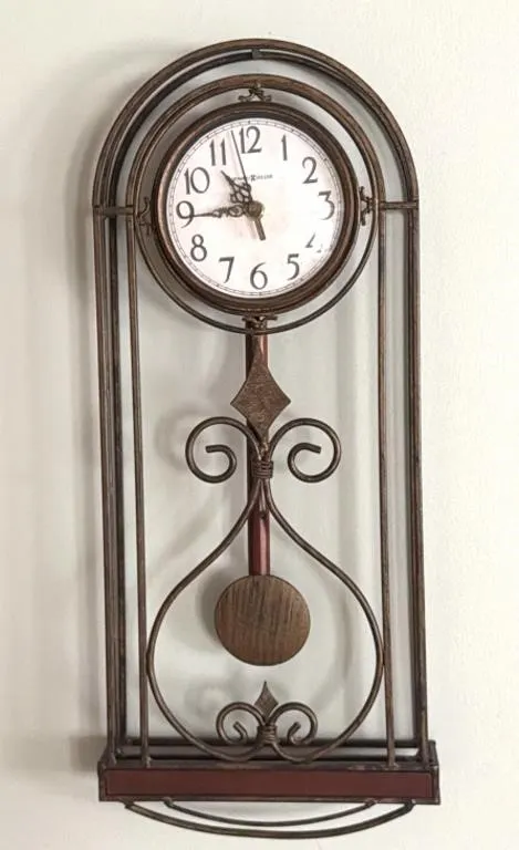 Howard Miller Metal Wall Clock 10”x2”x22”