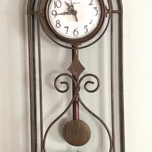 Howard Miller Metal Wall Clock 10”x2”x22”