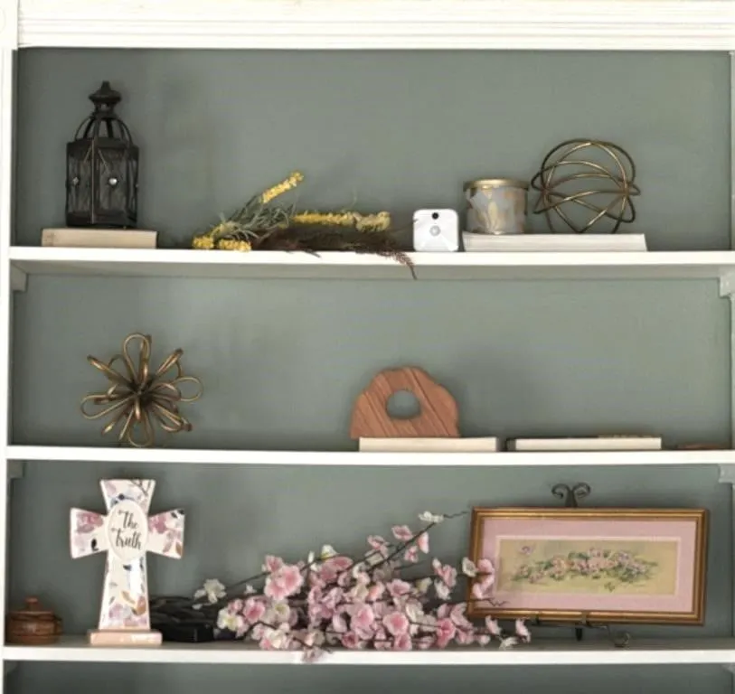 Metal Sculptures, Framed Floral Painting, And