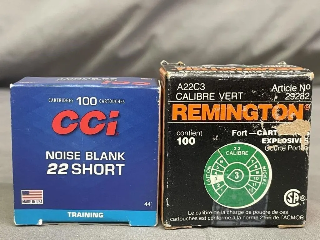 Open boxes of .22 cal. short noise blank training