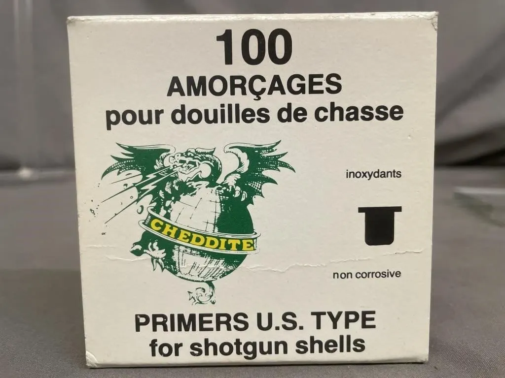 Open pack with 84 Cheddite primers for shotgun