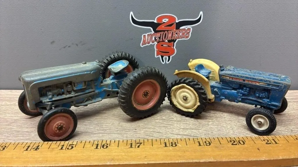 2 Rough Old Little Ford Tractors.