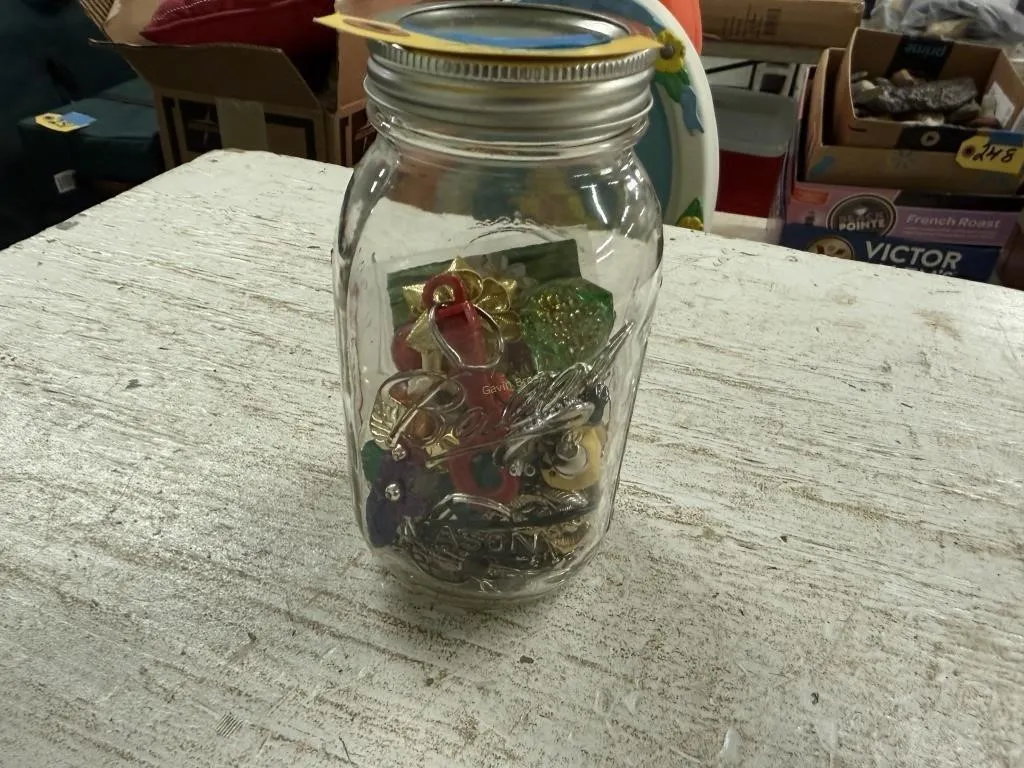 Jar of misc jewelry, Key chains etc