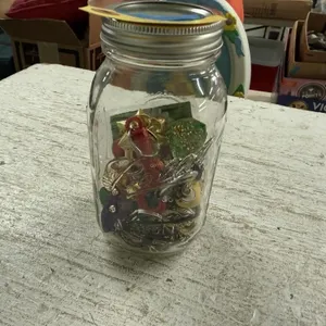 Jar of misc jewelry, Key chains etc