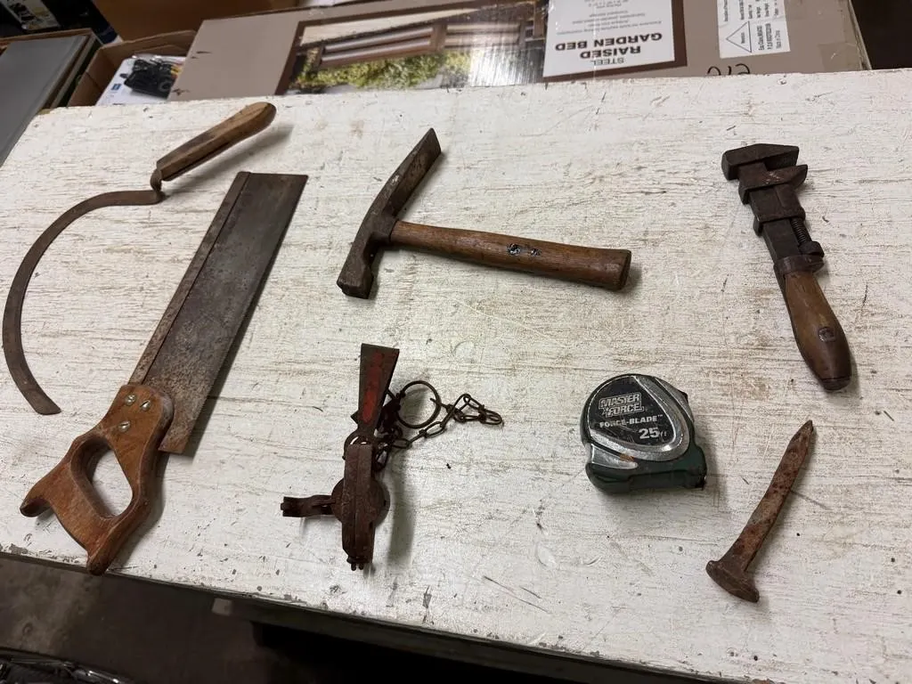 Tote of misc Tools. Tape Measures, Saw etc