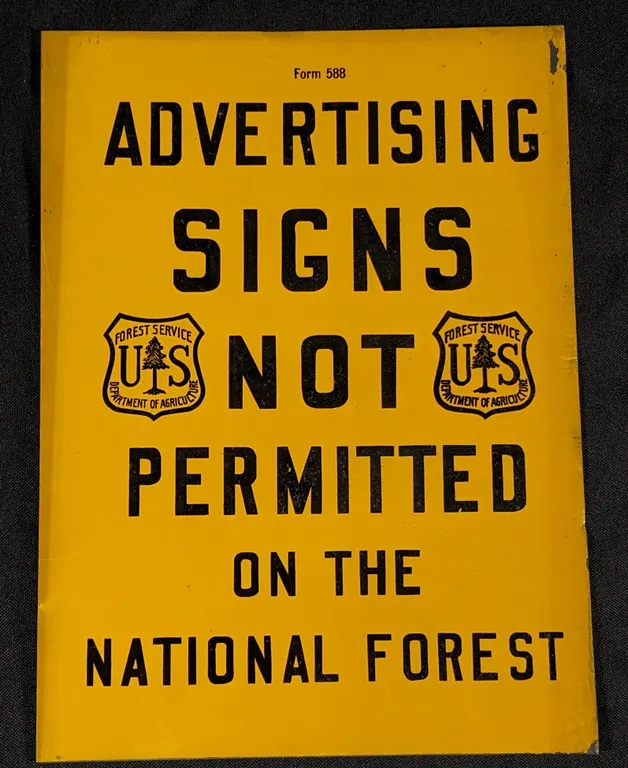 TIN SIGN US FOREST SERVICE ADVERTISING SIGNS NOT PERMITTED ON THE NATIONAL FOREST