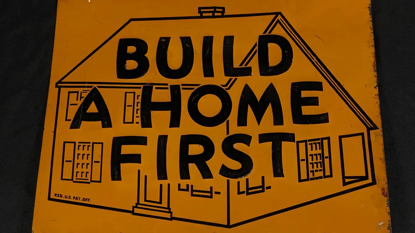 EMBOSSED TIN SIGN BUILD A HOME FIRST