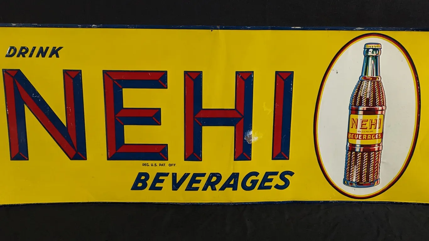 EMBOSSED TIN SIGN DRINK NEHI BEVERAGES