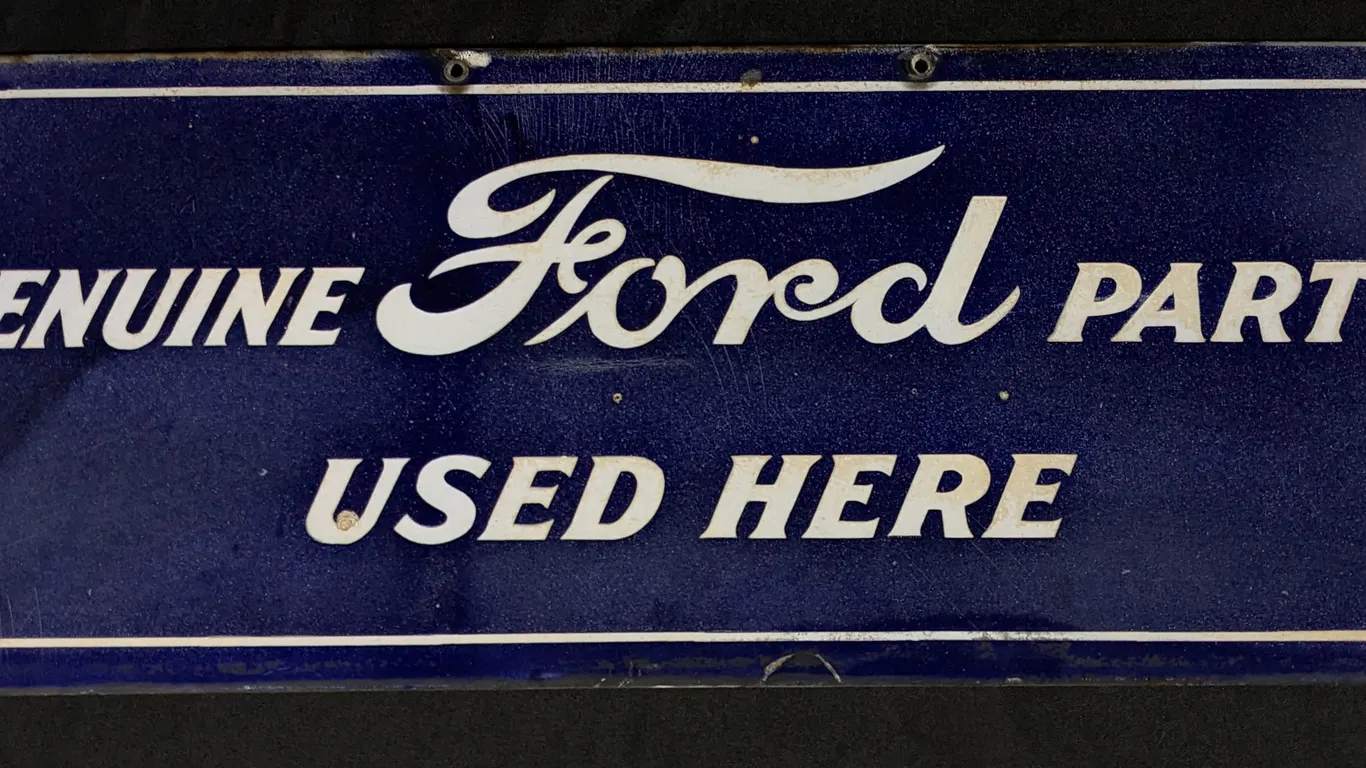 DATED 1919 PORCELAIN SIGN FORD GENUINE PARTS USED HERE