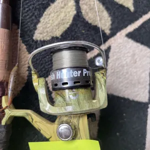Fish Hunter Pro 4-Bearing Spinning Reel and Daiwa Rod
