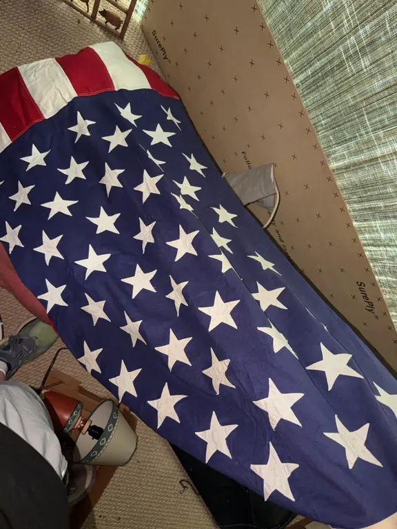 American Flags and Lot of Clothes and Blankets