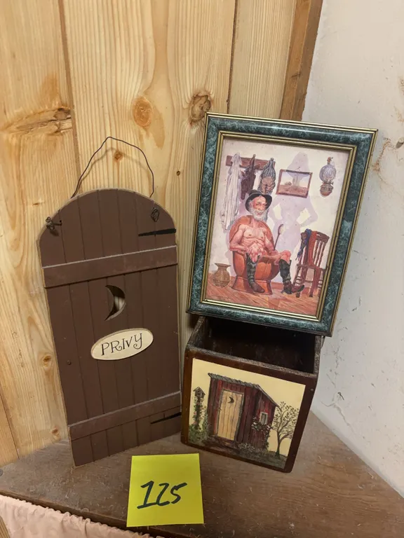Outhouse-Themed Wall Décor, Framed Artwork, and Wooden Box Grouping