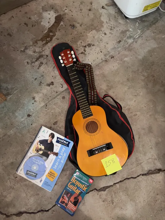 First Act Guitar with Bag, Strap, Book, CD, and VHS