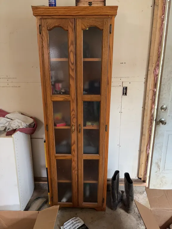 Oak Cabinet with Glass-Panel Doors and Contents