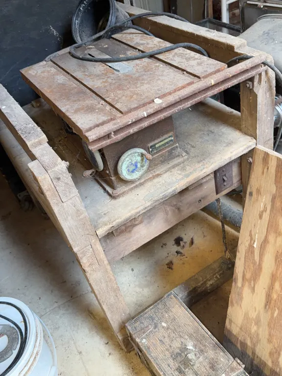 vintage, cast-iron Craftsman bench table saw