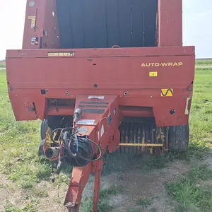 688 New Holland Auto wrap baler.