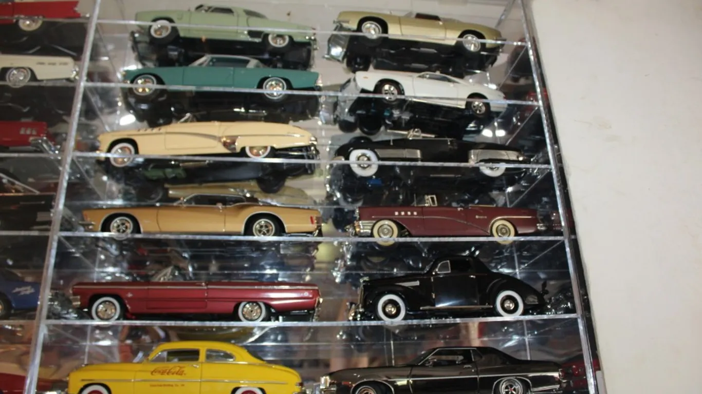 Plexiglas Display Cabinet with 12 1:18 Scale Diecast Models: 1976 Ford Gran Torino, 1949 Mercury Coca-Cola Edition, 1936 Pontiac Deluxe, Ertl 1964 Che