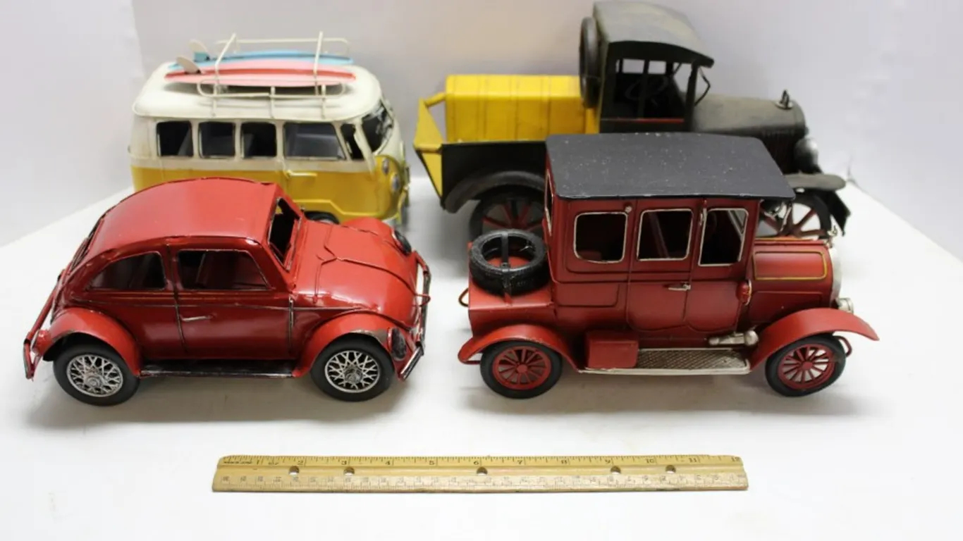4 Tin Model Cars