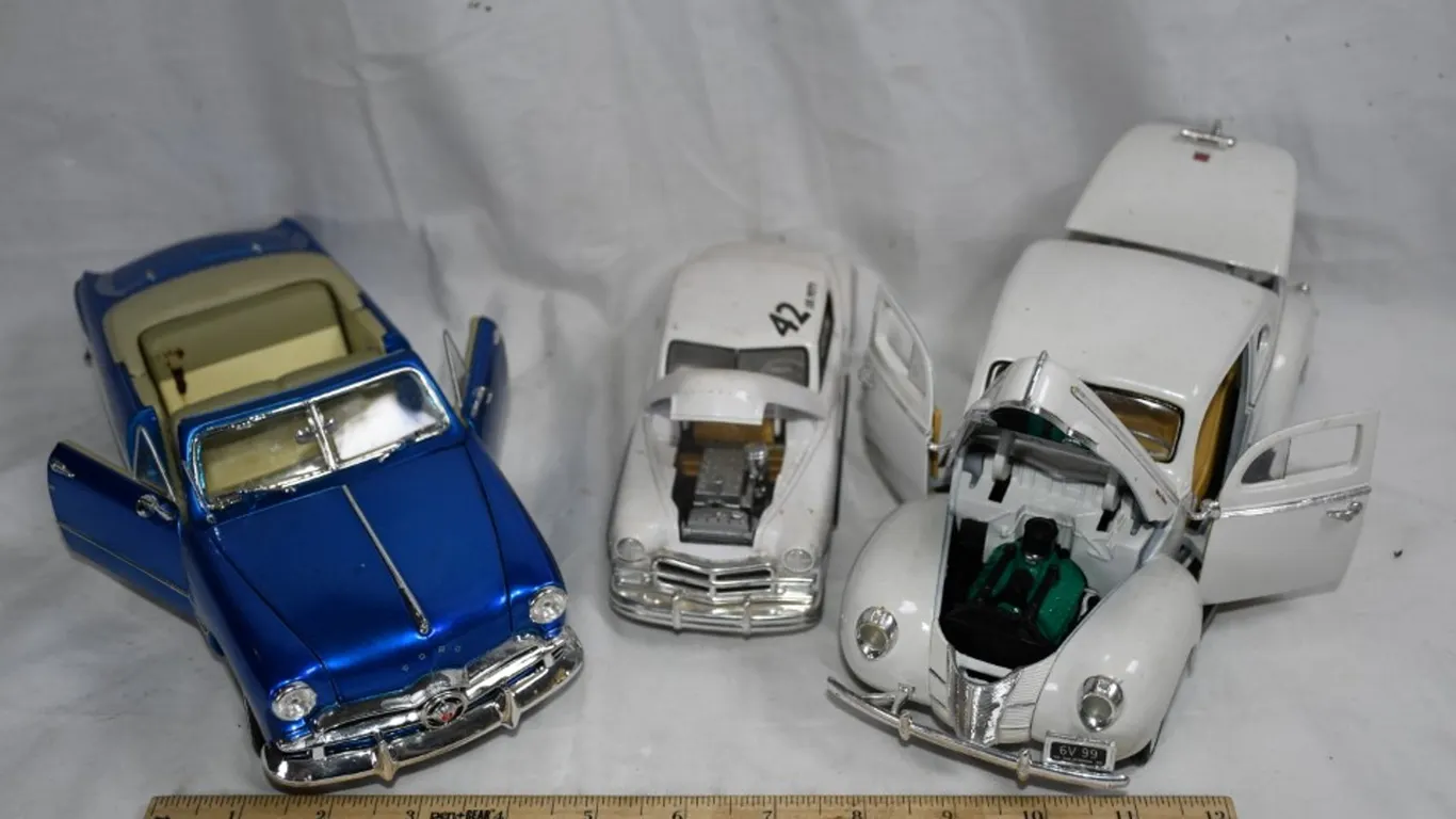3 Diecast Cars: Two 1:18 Scale and One 1:24 Scale