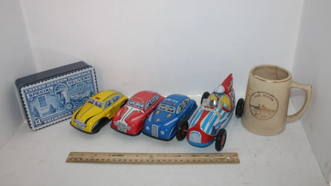 Wind up Cars, Wind up Motorcycle, and a Stein (Wind up Toys Made in China)