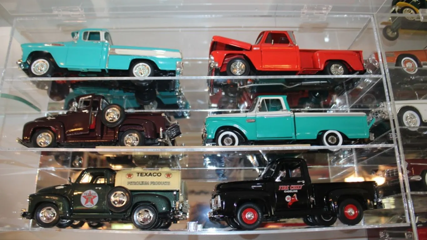 Plexiglass Display Case with Six 1:18 Scale Diecast Trucks, Display Measures 24 x 12 x 6 Ertl 1957 Chevy Pickup, Sunstar 65 Chevy Pickup, Mira 56 Ford