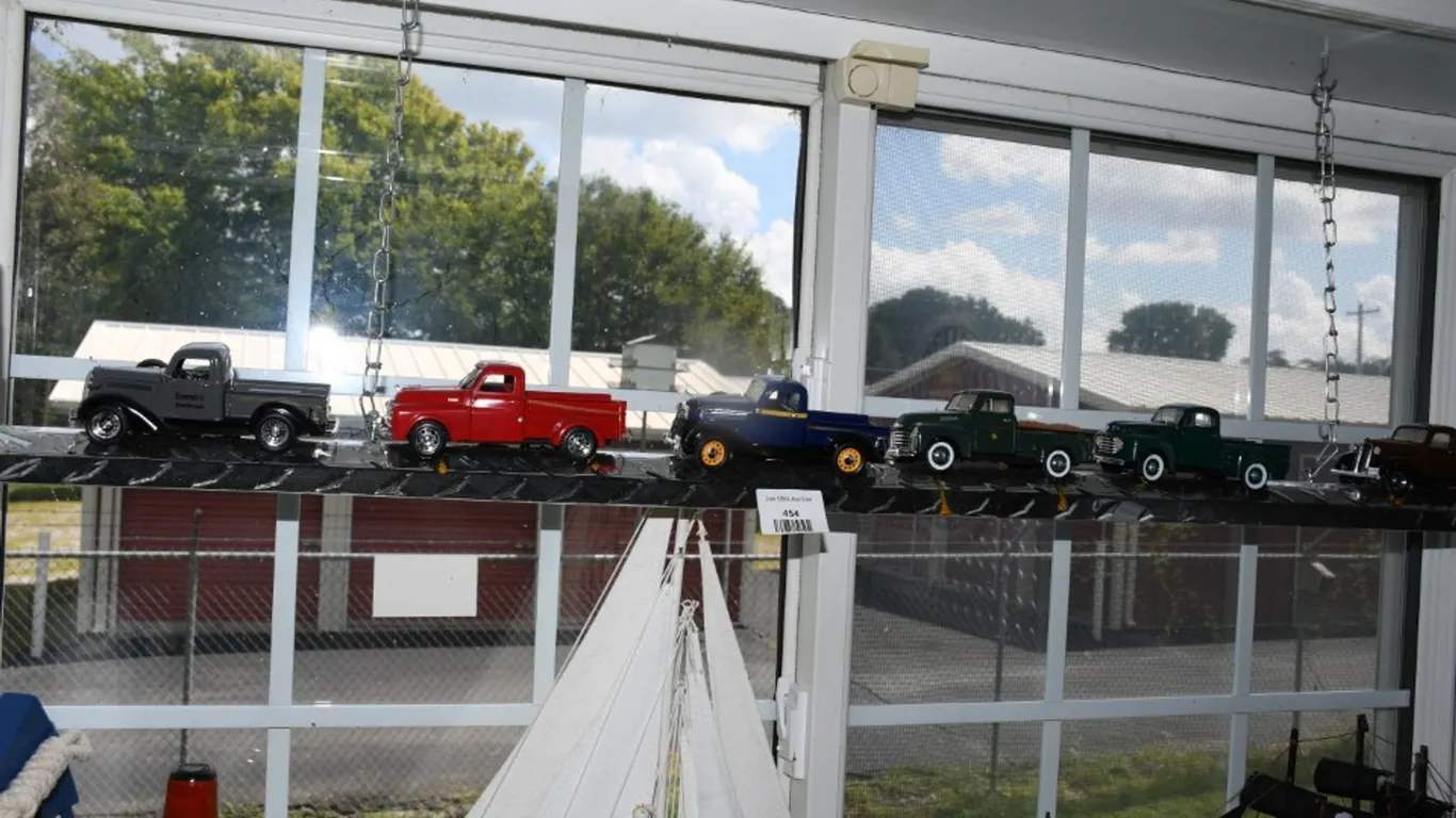 Diamond Bright Rail with 6 1:32 Scale Diecast Trucks Glued to It