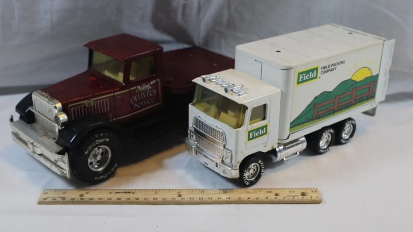 Two Nylint Toy Trucks, One Nylint Delivery Service with Broken Back Bumper and Missing a Headlight and a Nylint Field Packing Company Delivery Truck