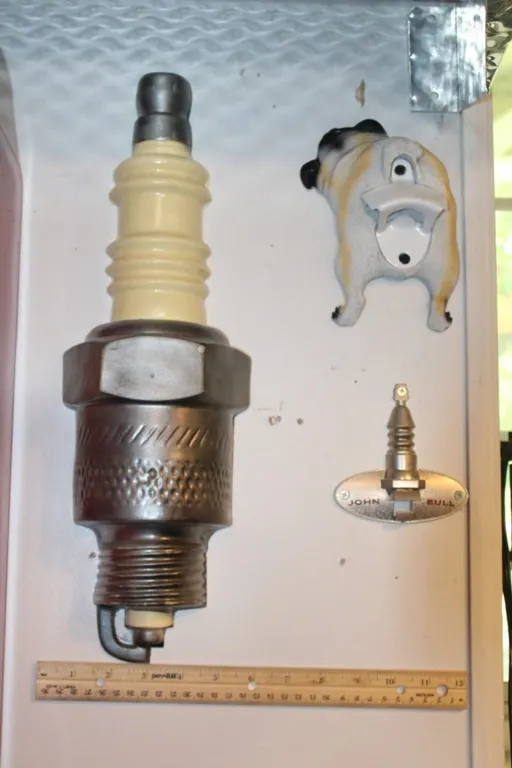 Two Bottle Openers and a Spark Plug Plaque