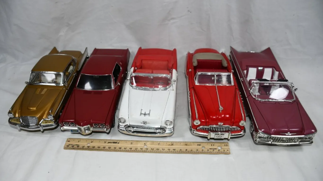 Five 1:18 Scale Diecast Models: Buick Electra, Pontiac Grand Prix, 1949 Buick, 1955 Oldsmobile,