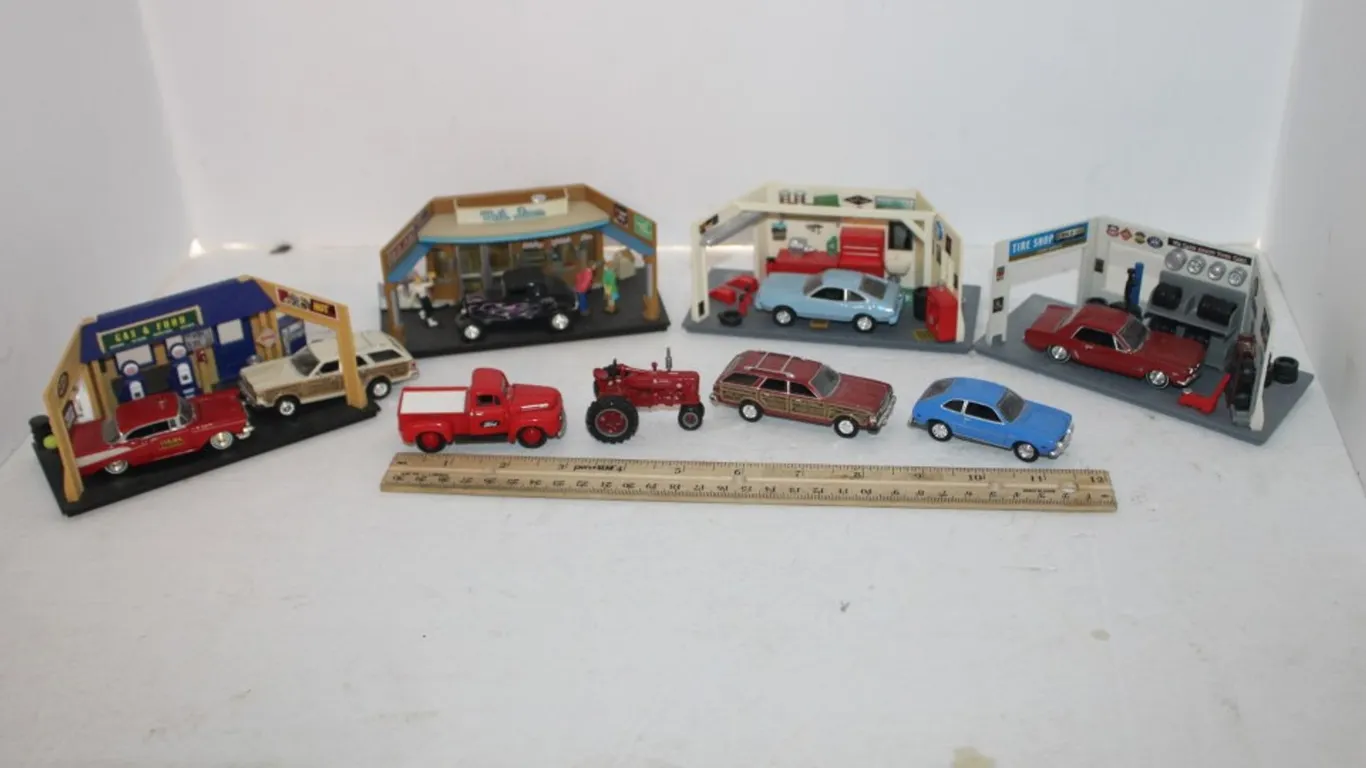 Toy Cars and Garages (Nine Pieces Total)