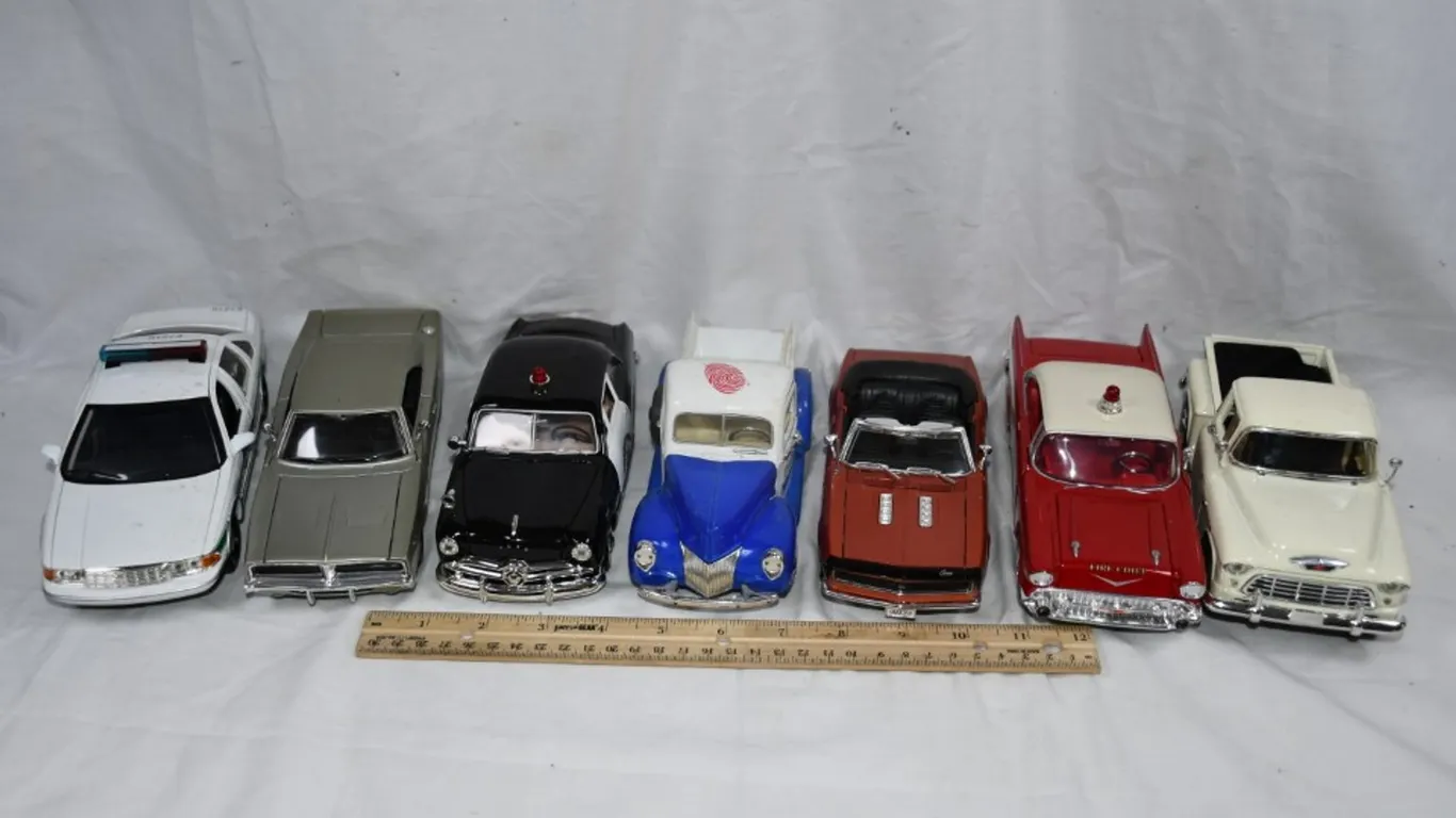 Seven 1:24 Scale Diecast Models: 1940 Dinty Moore Ford Pickup, 1955 Chevy Stepside,