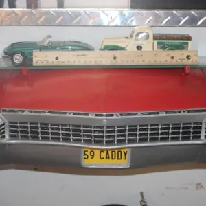1959 Cadillac Eldorado Wall Shelf with Two 1:24 Scale Diecast Cars, 1967 Corvette and a Golden Ford Forty, Display Shelf Measures 21 x 17 x 8.5