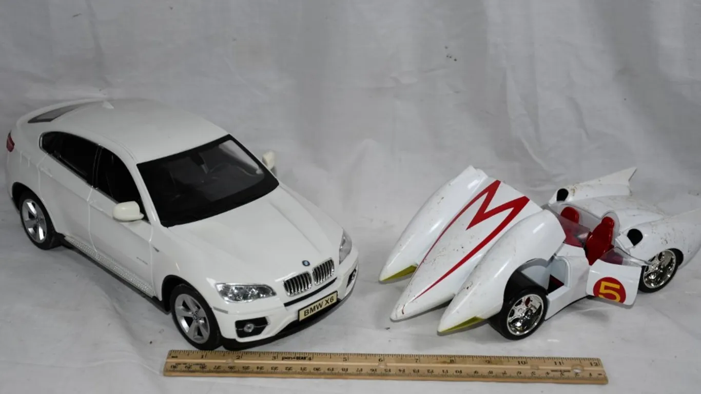 Two Model Cars, Plastic Battery Op BMW and a Die Cast Mach 5