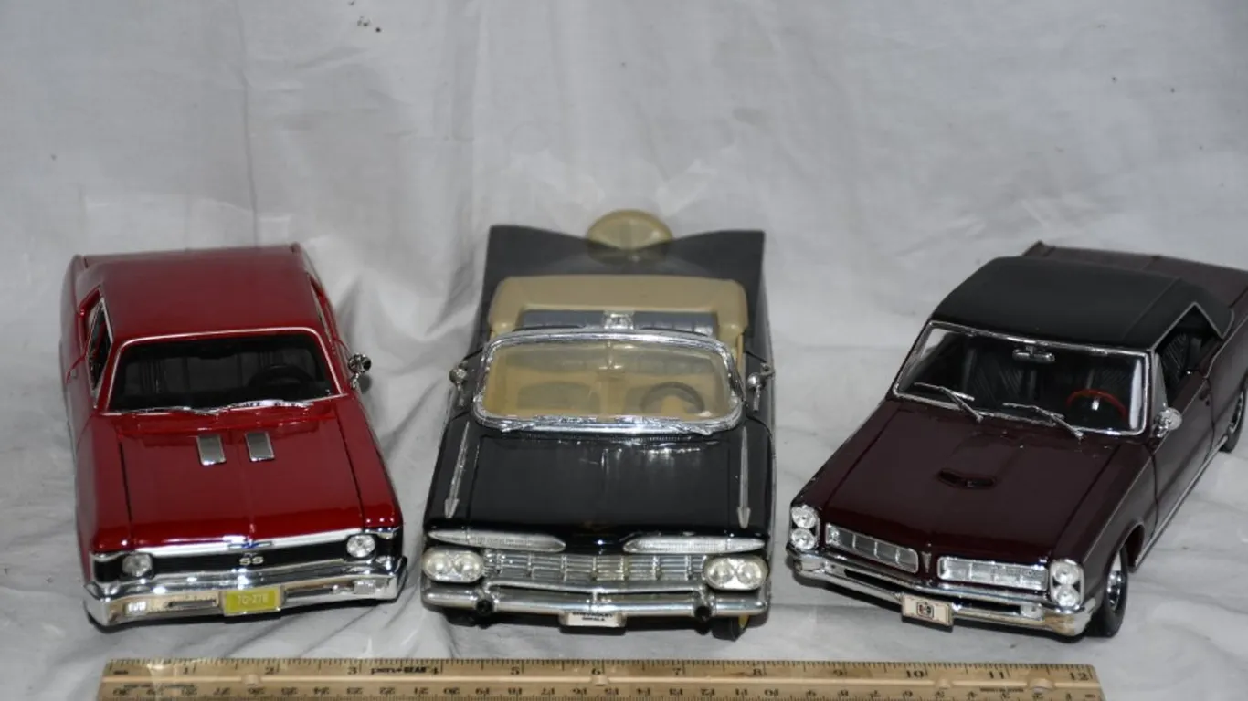 3 1:18 Scale Diecast Cars: 65 Pontiac GTO, 70 Chevy Nova SS, and a 59 Impala